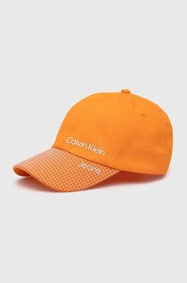 Calvin Klein Jeans czapka z daszkiem bawełniana dziecięca kolor pomarańczowy wzorzysta