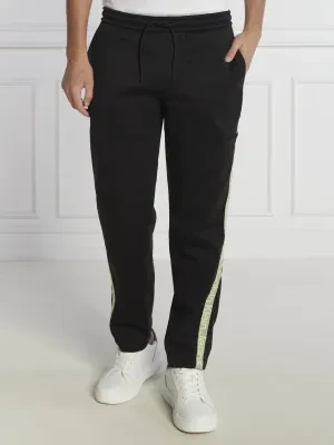 Calvin Klein Jeans Spodnie dresowe CUT OFF LOGO TAPE | Regular Fit
