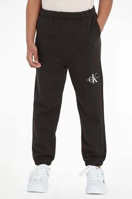 Calvin Klein Jeans spodnie dresowe dziecięce kolor czarny gładkie