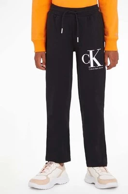 Calvin Klein Jeans spodnie dresowe dziecięce kolor czarny wzorzyste