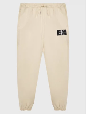 Calvin Klein Jeans Spodnie dresowe IB0IB01505 Beżowy Regular Fit