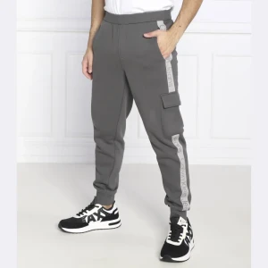Calvin Klein Jeans Spodnie dresowe LOGO TAPE | Regular Fit