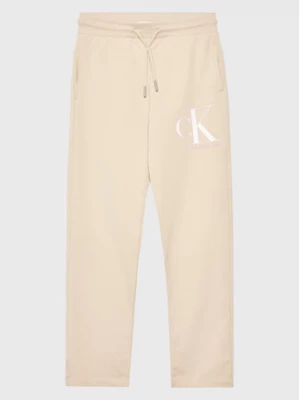 Calvin Klein Jeans Spodnie dresowe Monogram IG0IG01985 Beżowy Regular Fit