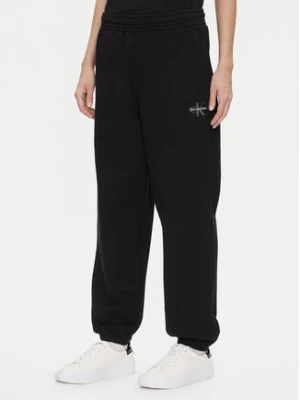 Calvin Klein Jeans Spodnie dresowe Monologo LV047B235G Czarny Regular Fit
