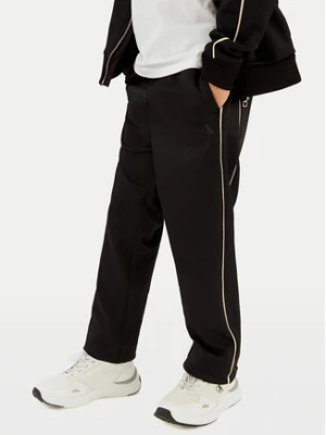 Calvin Klein Jeans Spodnie dresowe Piping IB0IB02606 Czarny Regular Fit
