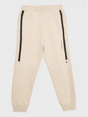 Calvin Klein Jeans Spodnie dresowe Seaming Skater IB0IB01506 Beżowy Regular Fit