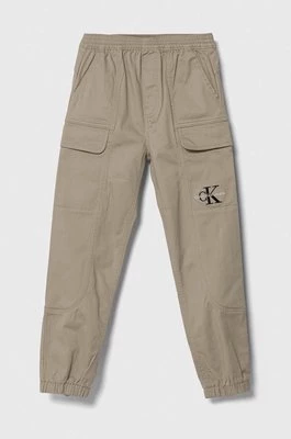Calvin Klein Jeans spodnie dziecięce kolor brązowy gładkie