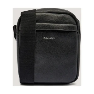 Calvin Klein Reporterka RAISED