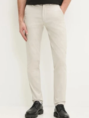 Calvin Klein spodnie męskie kolor beżowy dopasowane K10K113429
