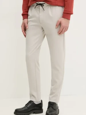 Calvin Klein spodnie męskie kolor beżowy dopasowane K10K113648