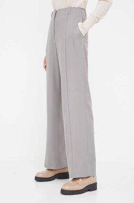 Calvin Klein spodnie wełniane kolor szary proste high waist