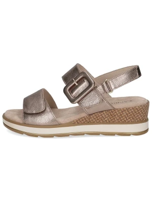 Caprice Skórzane sandały w kolorze złotym na koturnie rozmiar: 40