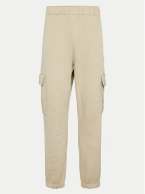 Champion Spodnie dresowe 117554 Beżowy Loose Fit