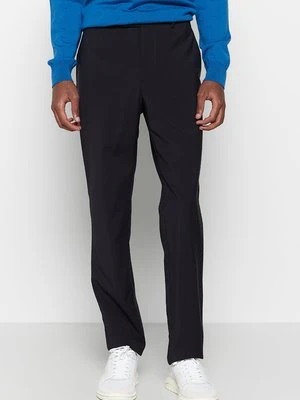 Chinosy Lacoste