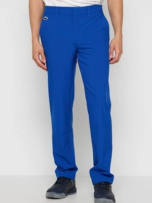 Chinosy Lacoste Sport