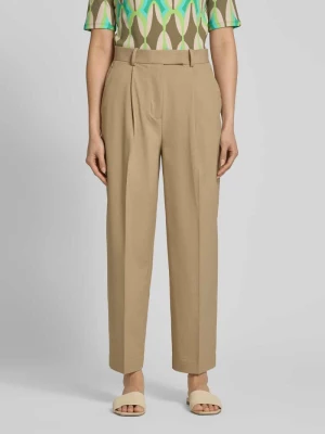 Chinosy o kroju tapered fit z wpuszczanymi kieszeniami Tommy Hilfiger Piaskowy