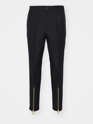 Chinosy Versace Jeans Couture