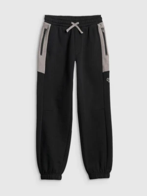 Chłopięce spodnie dresowe 4F 4FJRSS26TTROM1874 - czarne 4F JUNIOR