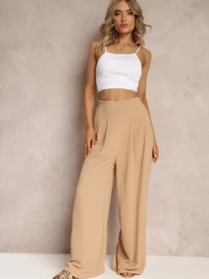 Ciemnobeżowe Spodnie Aedaris jus de pom