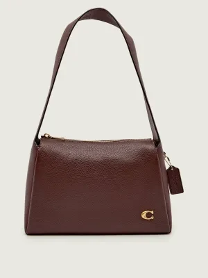 Coach Skórzana torebka na ramię Lola