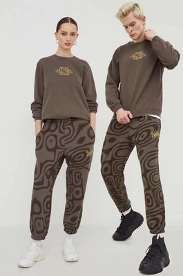 Converse spodnie dresowe bawełniane Converse x Wonka kolor brązowy wzorzyste