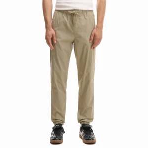 Cropp - Bawełniane beżowe spodnie jogger - beżowy