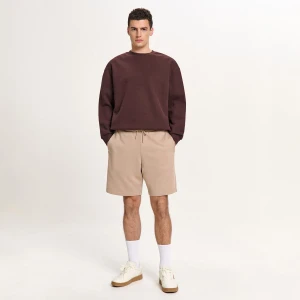 Cropp - Beżowe dresowe spodenki basic - beżowy