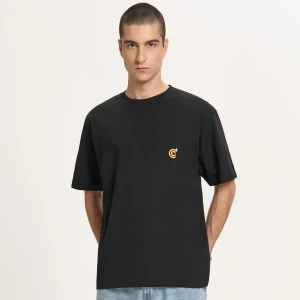 Cropp - Czarna koszulka z hipnotycznym nadrukiem - czarny