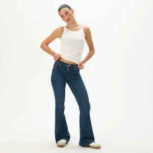 Cropp - Jeansy flare z efektem sprania - niebieski