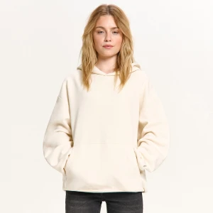 Cropp - Kremowa bluza hoodie z astrologicznym motywem - kremowy