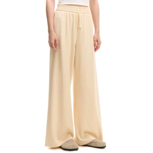 Cropp - Kremowe dresowe spodnie wide leg - kremowy