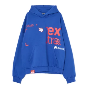 Cropp - Niebieska bluza z nieregularnymi nadrukami - niebieski