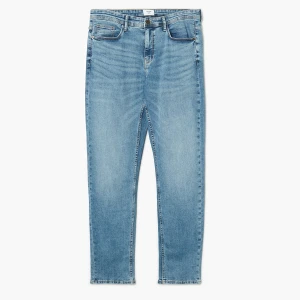 Cropp - Niebieskie jeansy slim z efektem sprania - niebieski
