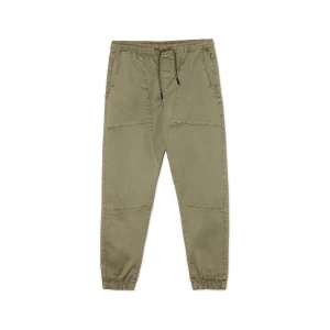 Cropp - Oliwkowe spodnie jogger regular z kieszeniami - zielony
