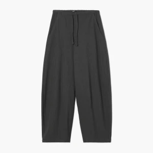 Cropp - Spodnie baggy z ozdobnymi zakładkami - szary