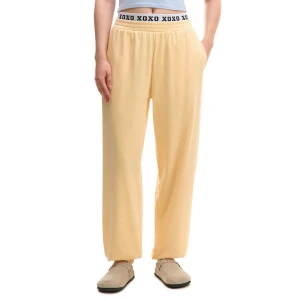 Cropp - Spodnie dresowe z napisem na gumce - kremowy