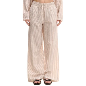 Cropp - Spodnie w brzoskwiniowe paski - beżowy