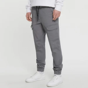 Cropp - Szare joggery z kieszeniami cargo - jasny szary