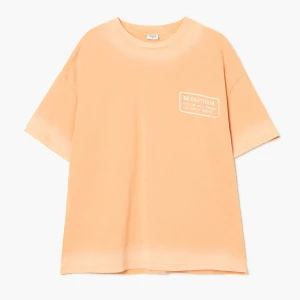 Cropp - T-shirt oversize z wakacyjnym motywem - pomarańczowy