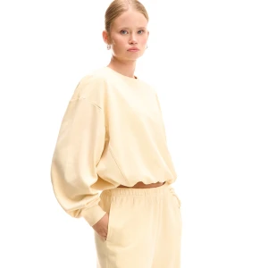 Cropp - Żółta bluza basic z prążkowanymi elementami - kremowy