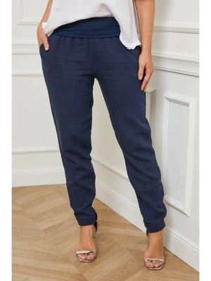 Curvy Lady Lniane spodnie "Provence" w kolorze granatowym rozmiar: 48/50