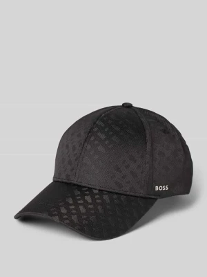 Czapka z daszkiem i monochromatycznym wzorem Boss