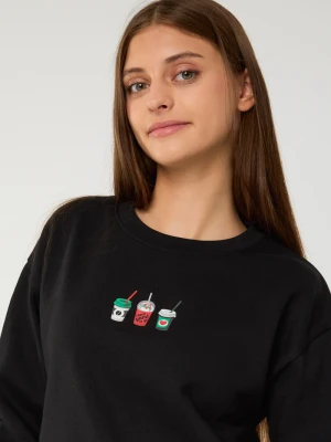 Czarna bluza dresowa z  nadrukiem Reporter