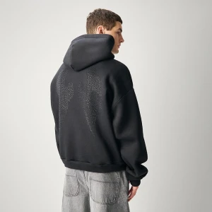 Czarna bluza oversize z kapturem i skrzydłami na plecach House