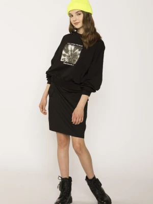 Czarna spódnica dla dziewczyny z klapami na kieszeniach Reporter