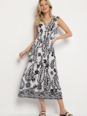 Czarna Sukienka z Roślinnym Wzorem i Kopertowym Dekoltem z Gumką w Talii Orrune j&x