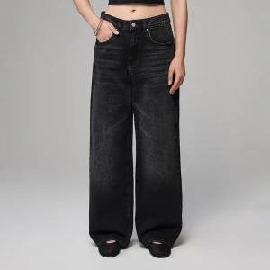 Czarne jeansy baggy fit mid waist z efektem sprania House