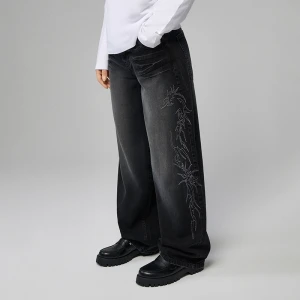 Czarne jeansy baggy fit z haftem tribal House
