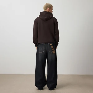 Czarne jeansy barrel fit z haftem gwiazdek House