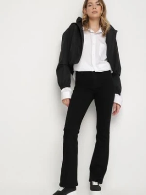 Czarne Jeansy o Kroju Dzwonów z Regularnym Stanem Fesarise daysie